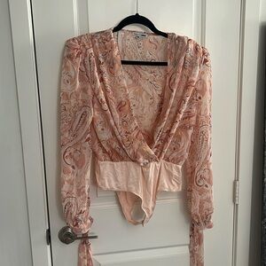 Fashion nova onesie, shoulder pads, paisley print